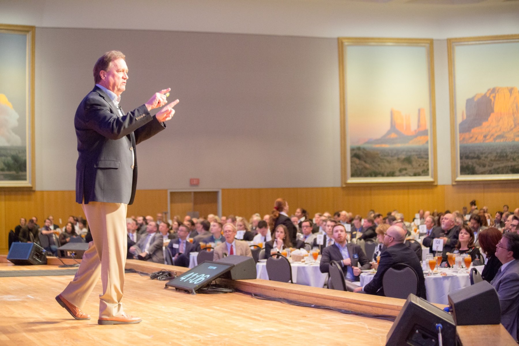 Jim Carroll speaking to a business conference audience